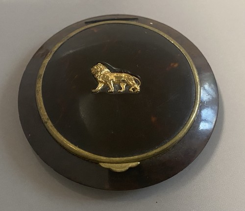 Poudrier ancien bakelite lion